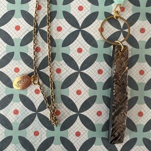 ViBella long gold colored chain with blue bead and wooden accent